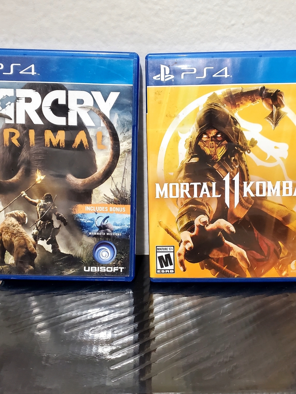 PS4: Far Cry Primal. Mortal Kombat 11.